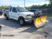 ✅ 2003 Ford F-150 XL • VIN: 1FTRX18W33NA17822 • Lot: 42250184. Listed on IAAI with 202,816 mi. Free auction sales archive from the USA and detailed vehicle history report at DreamBid. Image 1.