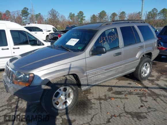 ✅ 1999 Jeep Grand Cherokee Laredo • VIN: 1J4GW58S1XC520727 • Lot: 43730318. Wystawiony na IAAI z przebiegiem 154 356 mil. Bezpłatny archiwum sprzedaży aukcyjnych z USA i szczegółowy raport historii pojazdu na DreamBid. Zdjęcie 17.