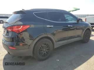 2014 Hyundai Santa Fe z VIN 5XYZUDLA6EG225077, wystawiony jako Copart lot #65020565 z przebiegiem 166 511 mil mil oraz Czysty tytuł • Clean title. Historia ofert i sprzedaży dostępna na DreamBid. Obrazek 3.