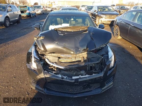 ✅ 2017 Cadillac ATS-V • VIN: 1G6AN5RY5H0118796 • Lot: 41148690. Listed on IAAI with 101,736 mi. Free auction sales archive from the USA and detailed vehicle history report at DreamBid. Image 12.