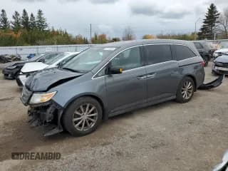 ✅ 2013 Honda Odyssey Touring • VIN: 5FNRL5H93DB505777 • Лот: 87415095. Опубликован ранее на Copart с пробегом 183 707 миль. Бесплатный доступ к архиву аукционных продаж из США и подробный отчёт об истории автомобиля на DreamBid. Изображение 1.