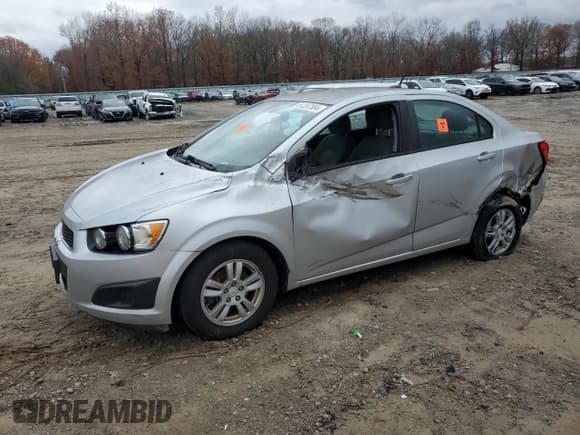 ✅ 2012 Chevrolet Sonic LS • VIN: 1G1JB5SHXC4152839 • Lot: 84397384. Listed on Copart with 132,162 mi. Free auction sales archive from the USA and detailed vehicle history report at DreamBid. Image 1.