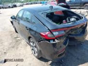 ✅ 2025 Honda Civic Sport Touring • VIN: 19XFL4H96SE006746 • Lot: 42861758. Listed on IAAI with 10,296 mi. Free auction sales archive from the USA and detailed vehicle history report at DreamBid. Image 3.