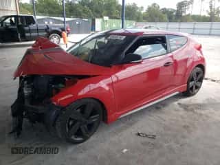 2015 Hyundai Veloster Turbo с VIN KMHTC6AE7FU218287, выставлен на аукционе Copart как лот 69455254 с пробегом Не указан миль и Списание • Salvage title. История ставок и продаж доступна на DreamBid. Изображение 1.
