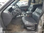 ✅ 2000 Jeep Grand Cherokee Limited • VIN: 1J4GW58N5YC227358 • Лот: 71481215. Опубликован ранее на Copart с пробегом 193 857 миль. Бесплатный доступ к архиву аукционных продаж из США и подробный отчёт об истории автомобиля на DreamBid. Изображение 7.