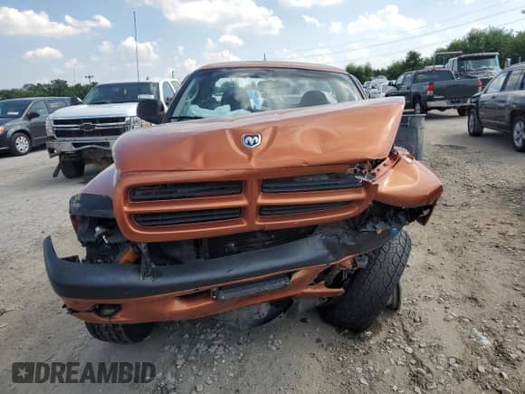 2001 Dodge Dakota Sport z VIN 1B7GG26N31S197440, wystawiony jako Copart lot #68280665 z przebiegiem Nie podano mil oraz Szkoda całkowita • Salvage title. Historia ofert i sprzedaży dostępna na DreamBid. Obrazek 5.