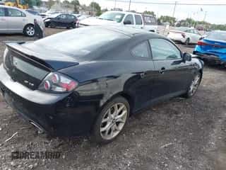 ✅ 2008 Hyundai Tiburon GT • VIN: KMHHN66FX8U268394 • Лот: 43293640. Опубликован ранее на IAAI с пробегом 66 751 миль. Бесплатный доступ к архиву аукционных продаж из США и подробный отчёт об истории автомобиля на DreamBid. Изображение 4.
