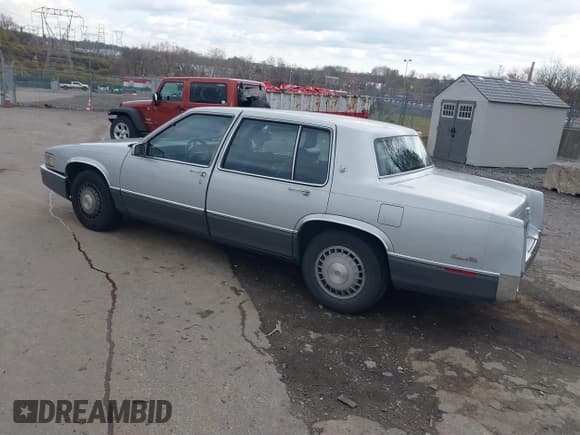 ✅ 1989 Cadillac DeVille • VIN: 1G6CD5159K4360262 • Lot: 40924468. Listed on IAAI with 92,802 mi. Free auction sales archive from the USA and detailed vehicle history report at DreamBid. Image 3.