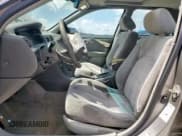 ✅ 1999 Toyota Camry LE • VIN: JT2BG22K4X0266090 • Lot: 71183525. Wystawiony na Copart z przebiegiem 219 373 mil. Bezpłatny archiwum sprzedaży aukcyjnych z USA i szczegółowy raport historii pojazdu na DreamBid. Zdjęcie 7.