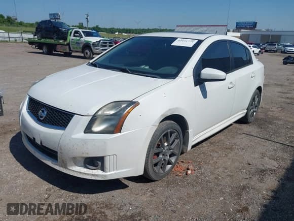✅ 2012 Nissan Sentra SE-R • VIN: 3N1BB6AP2CL670385 • Лот: 42431771. Опубликован ранее на IAAI с пробегом 186 513 миль. Бесплатный доступ к архиву аукционных продаж из США и подробный отчёт об истории автомобиля на DreamBid. Изображение 2.
