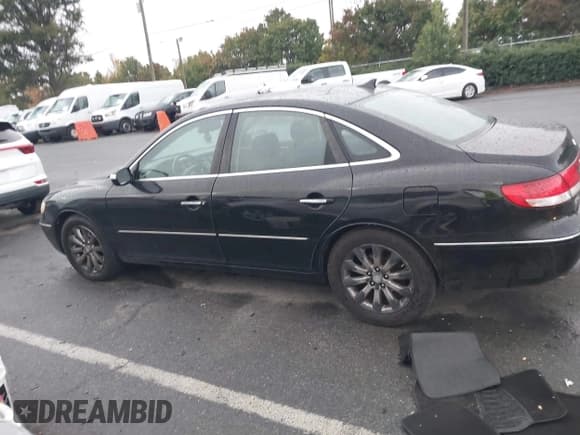 ✅ 2009 Hyundai Azera Limited • VIN: KMHFC46F69A342687 • Лот: 43541016. Опубликован ранее на IAAI с пробегом 163 425 миль. Бесплатный доступ к архиву аукционных продаж из США и подробный отчёт об истории автомобиля на DreamBid. Изображение 14.