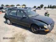 ✅ 1996 Toyota Corolla DX • VIN: 2T1BB02E5TC151146 • Lot: 67973194. Listed on Copart with 183,994 mi. Free auction sales archive from the USA and detailed vehicle history report at DreamBid. Image 4.