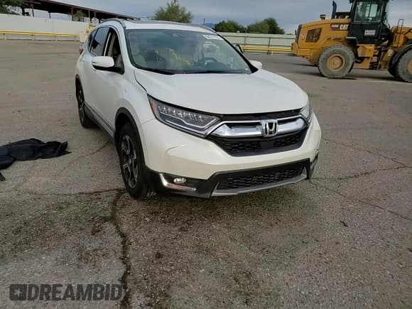 ✅ 2017 Honda CR-V Touring • VIN: 2HKRW2H96HH665391 • Lot: 94311795. Wystawiony na Copart z przebiegiem Nie podano. Bezpłatny archiwum sprzedaży aukcyjnych z USA i szczegółowy raport historii pojazdu na DreamBid. Zdjęcie 14.