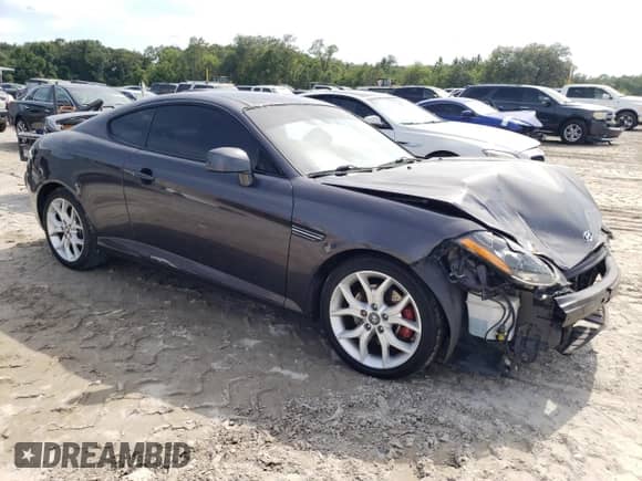2008 Hyundai Tiburon GT с VIN KMHHN66F58U284485, выставлен на аукционе Copart как лот 61948765 с пробегом 134 445 миль миль и Списание • Salvage title. История ставок и продаж доступна на DreamBid. Изображение 4.