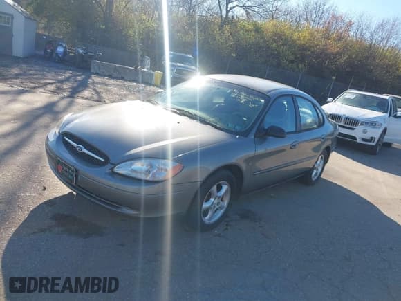 ✅ 2001 Ford Taurus SE • VIN: 1FAFP53S81G133214 • Лот: 43765502. Опубликован ранее на IAAI с пробегом 217 790 миль. Бесплатный доступ к архиву аукционных продаж из США и подробный отчёт об истории автомобиля на DreamBid. Изображение 2.