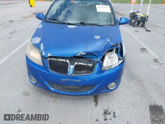 ✅ 2009 Pontiac G3 • VIN: KL2TD66E89B673694 • Lot: 42329972. Wystawiony na IAAI z przebiegiem 196 569 mil. Bezpłatny archiwum sprzedaży aukcyjnych z USA i szczegółowy raport historii pojazdu na DreamBid. Zdjęcie 6.