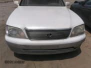 ✅ 2000 Lexus LS 400 • VIN: JT8BH28F4Y0180311 • Lot: 42517050. Listed on IAAI with 223,410 mi. Free auction sales archive from the USA and detailed vehicle history report at DreamBid. Image 6.