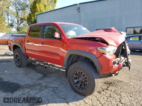 ✅ 2017 Toyota Tacoma TRD Off Road • VIN: 3TMCZ5AN4HM105644 • Lot: 82253995. Listed on Copart with 105,925 mi. Free auction sales archive from the USA and detailed vehicle history report at DreamBid. Image 4.