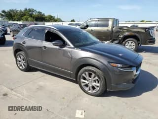 ✅ 2021 Mazda CX-30 Premium • VIN: 3MVDMBDL5MM272339 • Lot: 61094694. Wystawiony na Copart z przebiegiem 69 084 mil. Bezpłatny archiwum sprzedaży aukcyjnych z USA i szczegółowy raport historii pojazdu na DreamBid. Zdjęcie 4.