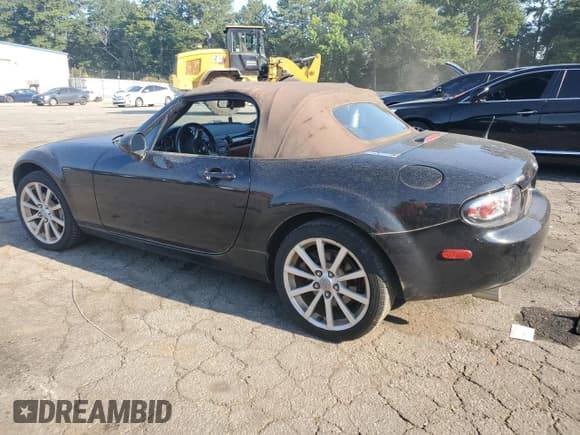 ✅ 2006 Mazda MX-5 Miata Touring • VIN: JM1NC25F660107925 • Lot: 64079215. Wystawiony na Copart z przebiegiem 133 522 mil. Bezpłatny archiwum sprzedaży aukcyjnych z USA i szczegółowy raport historii pojazdu na DreamBid. Zdjęcie 2.