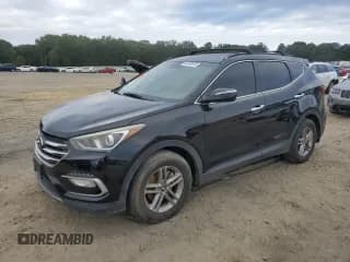✅ 2018 Hyundai Santa Fe 2.4L • VIN: 5XYZUDLB0JG512031 • Лот: 84948615. Опубликован ранее на Copart с пробегом 161 628 миль. Бесплатный доступ к архиву аукционных продаж из США и подробный отчёт об истории автомобиля на DreamBid. Изображение 1.