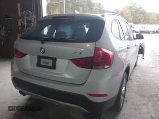 ✅ 2014 BMW X1 xDrive28i • VIN: WBAVL1C50EVY12027 • Lot: 43537124. Listed on IAAI with 84,465 mi. Free auction sales archive from the USA and detailed vehicle history report at DreamBid. Image 4.