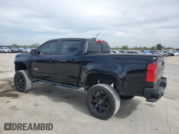 ✅ 2021 Chevrolet Colorado 4WD Z71 • VIN: 1GCGTDENXM1298123 • Lot: 86788515. Listed on Copart with 27,720 mi. Free auction sales archive from the USA and detailed vehicle history report at DreamBid. Image 2.
