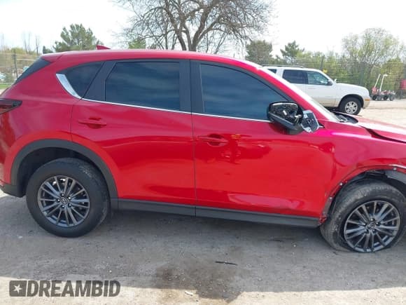 ✅ 2020 Mazda CX-5 Touring • VIN: JM3KFBCM2L0846174 • Lot: 42203758. Wystawiony na IAAI z przebiegiem 58 617 mil. Bezpłatny archiwum sprzedaży aukcyjnych z USA i szczegółowy raport historii pojazdu na DreamBid. Zdjęcie 13.