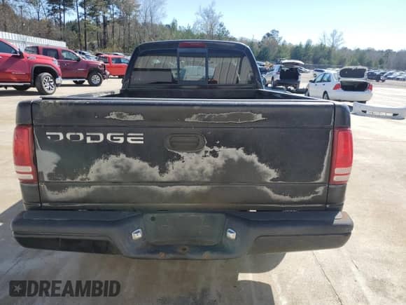 2000 Dodge Dakota z VIN 1B7FL26P6YS582901, wystawiony jako Copart lot #49786315 z przebiegiem 165 727 mil mil oraz Szkoda całkowita • Salvage title. Historia ofert i sprzedaży dostępna na DreamBid. Obrazek 6.