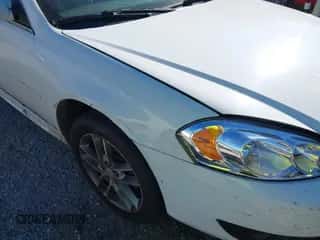 2013 Chevrolet Impala LTZ z VIN 2G1WC5E39D1173228, wystawiony jako IAAI lot #43400363 z przebiegiem 202 040 mil mil oraz . Historia ofert i sprzedaży dostępna na DreamBid. Obrazek 6.