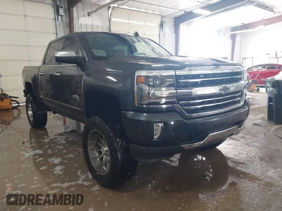 ✅ 2017 Chevrolet Silverado 1500 High Country • VIN: 3GCUKTEJ3HG296721 • Lot: 41609238. Listed on IAAI with 129,811 mi. Free auction sales archive from the USA and detailed vehicle history report at DreamBid. Image 1.