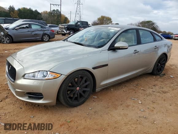 ✅ 2014 Jaguar XJ • VIN: SAJWA1CZ5E8V71971 • Лот: 82116114. Опубликован ранее на Copart с пробегом 127 164 миль. Бесплатный доступ к архиву аукционных продаж из США и подробный отчёт об истории автомобиля на DreamBid. Изображение 1.