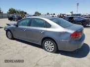 ✅ 2014 Volkswagen Passat Wolfsburg Edition • VIN: 1VWAT7A33EC113036 • Lot: 66185105. Listed on Copart with 104,324 mi. Free auction sales archive from the USA and detailed vehicle history report at DreamBid. Image 2.