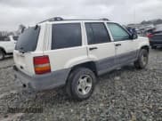 ✅ 1997 Jeep Grand Cherokee TSi • VIN: 1J4FX58S0VC578818 • Lot: 48463795. Wystawiony na Copart z przebiegiem 133 200 mil. Bezpłatny archiwum sprzedaży aukcyjnych z USA i szczegółowy raport historii pojazdu na DreamBid. Zdjęcie 3.