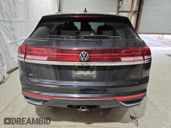 ✅ 2025 Volkswagen Atlas SE • VIN: 1V2HE2CA0SC205077 • Лот: 87250175. Опубликован ранее на Copart с пробегом 30 027 миль. Бесплатный доступ к архиву аукционных продаж из США и подробный отчёт об истории автомобиля на DreamBid. Изображение 6.