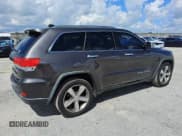 ✅ 2015 Jeep Grand Cherokee Limited • VIN: 1C4RJEBG6FC906320 • Lot: 81384665. Listed on Copart with 140,796 mi. Free auction sales archive from the USA and detailed vehicle history report at DreamBid. Image 3.