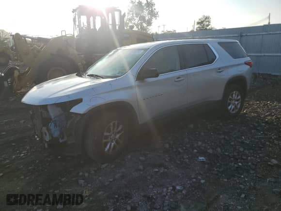 2018 Chevrolet Traverse LS with VIN 1GNEVFKW6JJ199862, listed as a Copart auction lot 69984765 with 74,949 mi miles and Salvage title. Bid and sale history available at DreamBid. Image 1.