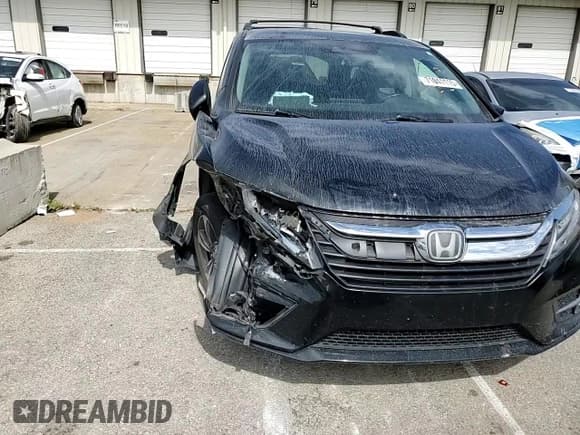 ✅ 2018 Honda Odyssey Touring • VIN: 5FNRL6H89JB043637 • Lot: 71041115. Wystawiony na Copart z przebiegiem 177 861 mil. Bezpłatny archiwum sprzedaży aukcyjnych z USA i szczegółowy raport historii pojazdu na DreamBid. Zdjęcie 14.