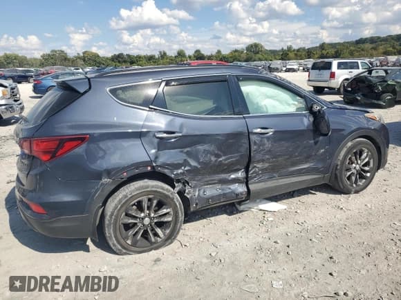 ✅ 2018 Hyundai Santa Fe 2.0T • VIN: 5XYZU4LA4JG529079 • Лот: 81975085. Опубликован ранее на Copart с пробегом 164 631 миль. Бесплатный доступ к архиву аукционных продаж из США и подробный отчёт об истории автомобиля на DreamBid. Изображение 3.