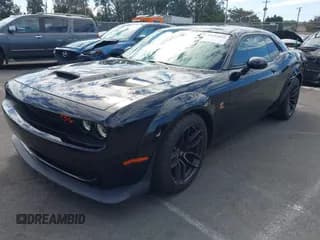 ✅ 2021 Dodge Challenger R/T Scat Pack Widebody • VIN: 2C3CDZFJ7MH677011 • Lot: 43412091. Wystawiony na IAAI z przebiegiem 26 783 mil. Bezpłatny archiwum sprzedaży aukcyjnych z USA i szczegółowy raport historii pojazdu na DreamBid. Zdjęcie 2.