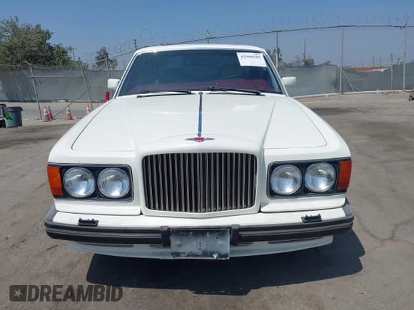 ✅ 1990 Bentley Turbo R • VIN: SCBZR03DXLCX32699 • Lot: 42960582. Wystawiony na IAAI z przebiegiem 38 147 mil. Bezpłatny archiwum sprzedaży aukcyjnych z USA i szczegółowy raport historii pojazdu na DreamBid. Zdjęcie 12.