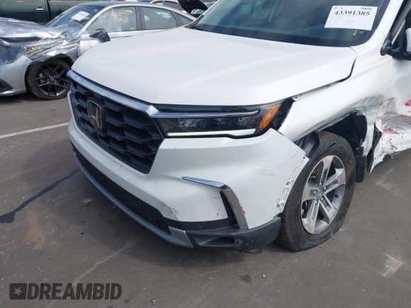 ✅ 2024 Honda Pilot EX-L • VIN: 5FNYG2H47RB012582 • Лот: 43391385. Опубликован ранее на IAAI с пробегом 14 845 миль. Бесплатный доступ к архиву аукционных продаж из США и подробный отчёт об истории автомобиля на DreamBid. Изображение 19.