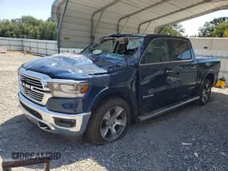 2020 Ram 1500 Laramie с VIN 1C6SRFJT9LN327537, выставлен на аукционе Copart как лот 70002645 с пробегом 51 449 миль миль и Списание • Salvage title. История ставок и продаж доступна на DreamBid. Изображение 1.