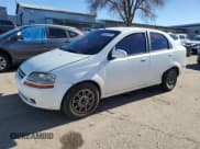 ✅ 2006 Chevrolet Aveo LS • VIN: KL1TD56616B542030 • Лот: 82115273. Опубликован ранее на Copart с пробегом 156 396 миль. Бесплатный доступ к архиву аукционных продаж из США и подробный отчёт об истории автомобиля на DreamBid. Изображение 1.