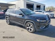 ✅ 2019 Jeep Cherokee Limited • VIN: 1C4PJMDX2KD121456 • Lot: 80253135. Listed on Copart with 152,670 mi. Free auction sales archive from the USA and detailed vehicle history report at DreamBid. Image 4.