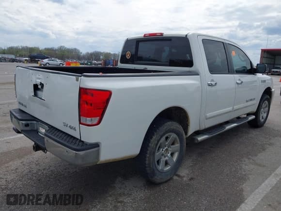 ✅ 2011 Nissan Titan SL • VIN: 1N6AA0EC7BN313599 • Lot: 41888934. Listed on IAAI with 182,894 mi. Free auction sales archive from the USA and detailed vehicle history report at DreamBid. Image 4.