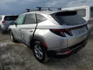 ✅ 2022 Hyundai Tucson SEL • VIN: 5NMJB3AE5NH143575 • Lot: 76587554. Wystawiony na Copart z przebiegiem 14 103 mil. Bezpłatny archiwum sprzedaży aukcyjnych z USA i szczegółowy raport historii pojazdu na DreamBid. Zdjęcie 2.