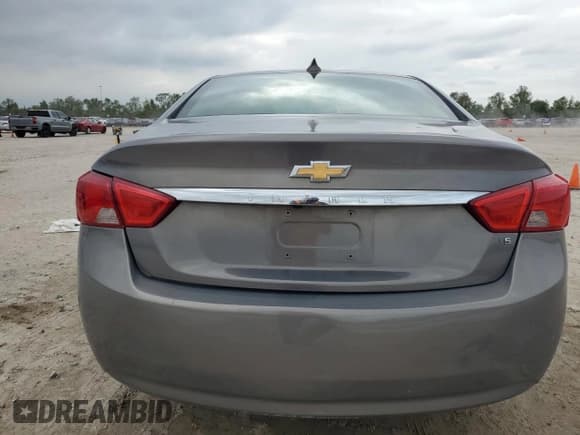 ✅ 2018 Chevrolet Impala LT • VIN: 2G1105S35J9132440 • Лот: 79299114. Опубликован ранее на Copart с пробегом 130 869 миль. Бесплатный доступ к архиву аукционных продаж из США и подробный отчёт об истории автомобиля на DreamBid. Изображение 6.