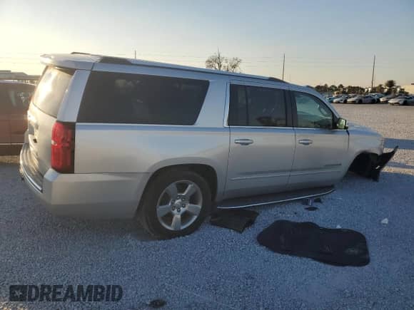 2020 Chevrolet Suburban Premier с VIN 1GNSCJKC9LR198484, выставлен на аукционе Copart как лот 87354514 с пробегом 115 008 миль миль и Списание • Salvage title. История ставок и продаж доступна на DreamBid. Изображение 3.