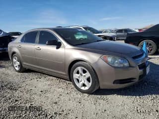 ✅ 2011 Chevrolet Malibu 1FL • VIN: 1G1ZA5EUXBF111290 • Lot: 77703924. Listed on Copart with 131,049 mi. Free auction sales archive from the USA and detailed vehicle history report at DreamBid. Image 4.